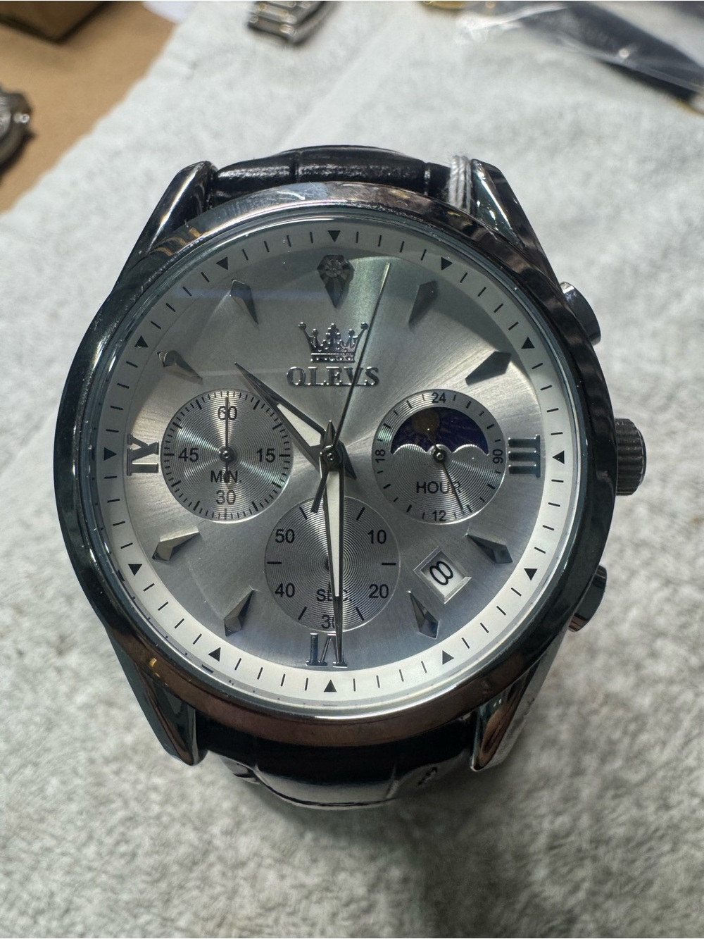 OLEVS Men’s Silver Dial Black Leather Strap Watch